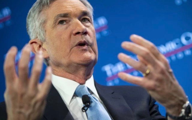Federal Reserve keeps interest rates on hold, signals end of rate rises