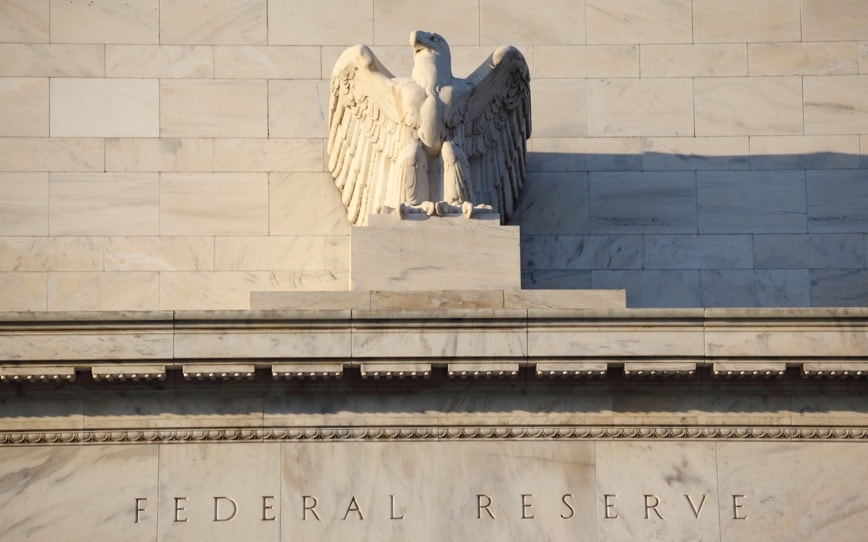 Federal Reserve keeps interest rates on hold, signals three rates cuts in 2024