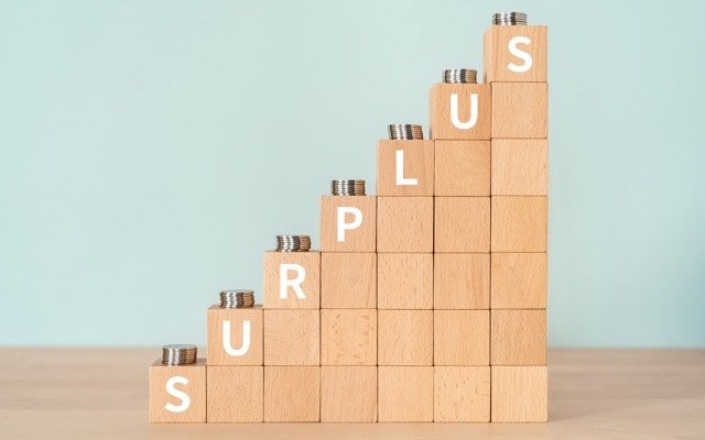 Government coffers flush with cash as households feel the squeeze