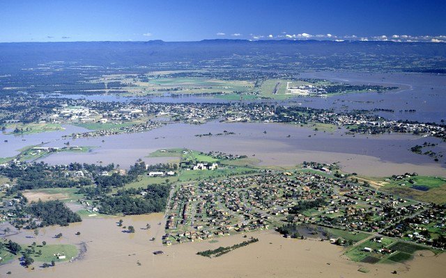 Massive floods raise questions about insurance and even mortgages