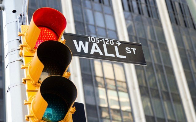 Behind the red light indicator that is predicting a recession